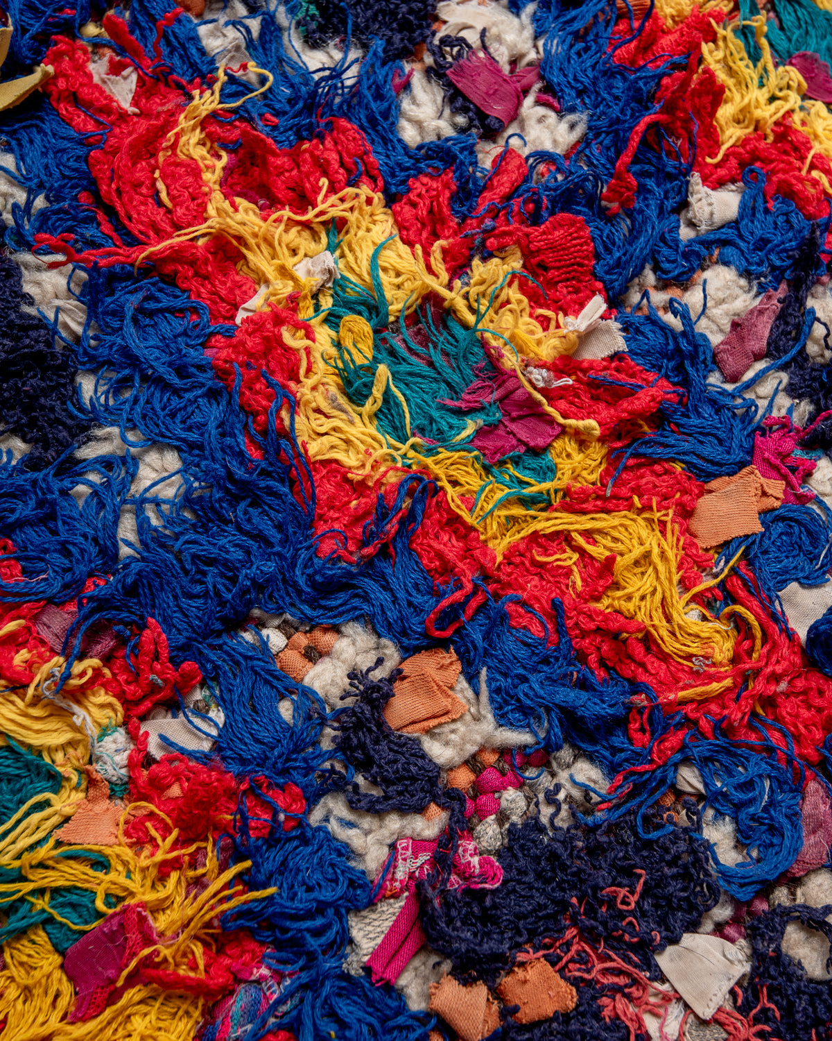 Modern designer vintage handcrafted Berber rug from Morocco. Boucherouite with beautiful colors and patterns.